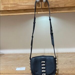 Chic Black Crossbody Bag with Buckle Details